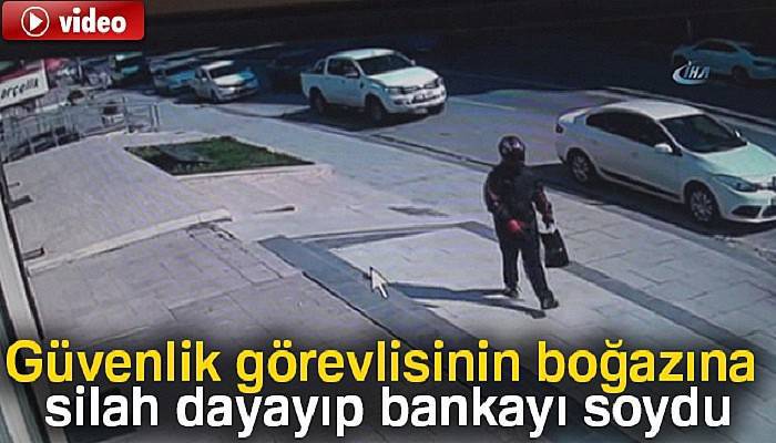 Güvenlik görevlisinin boğazına silah dayayıp bankayı soydu