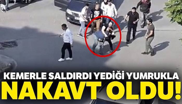 Kemerle saldıran sürücü, yediği yumrukla nakavt oldu